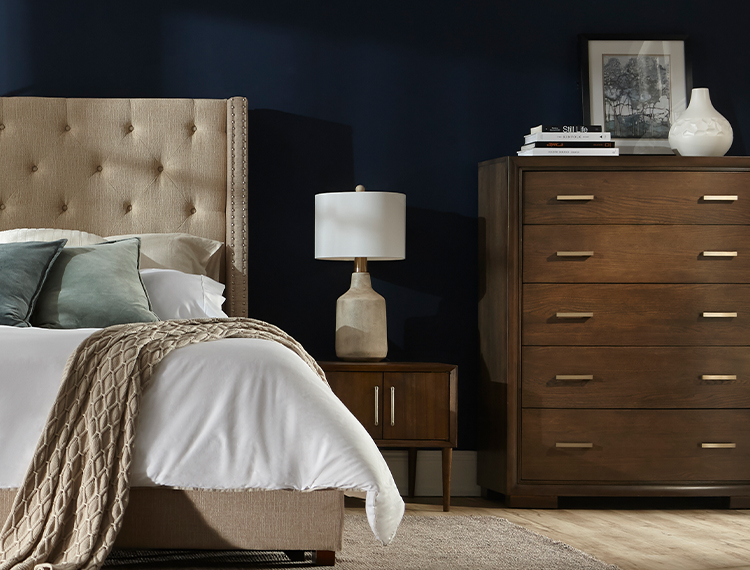 Bedroom with dresser and lamp