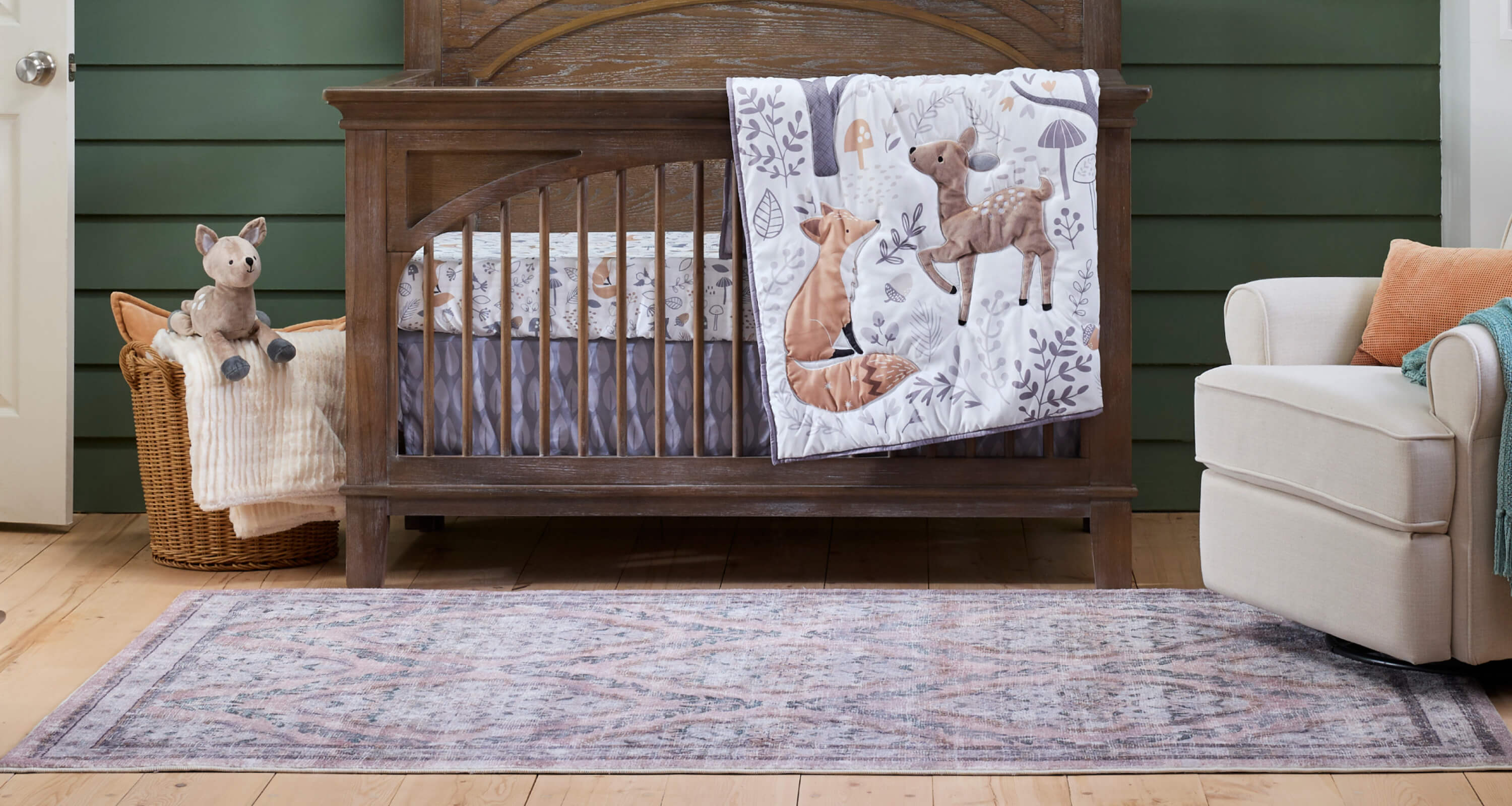 Parker Mini Convertible Baby Crib with Mattress and Two Sheets by Delta